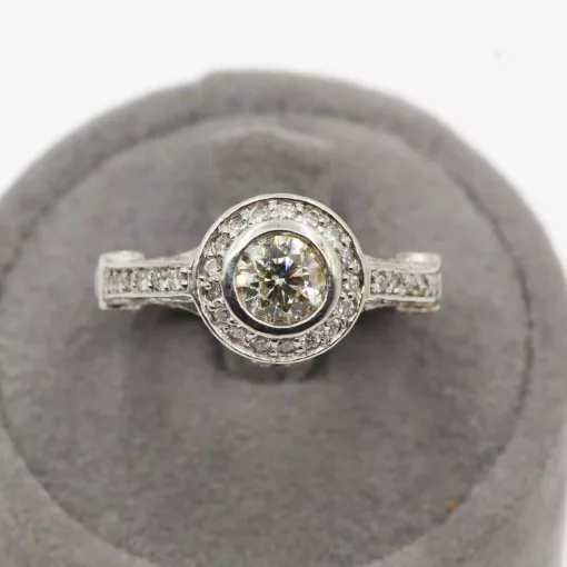 ANELLO CON BRILLANTE CENTRALE </br> CQOX 24974