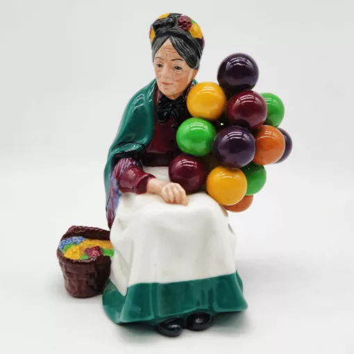 PORCELLANA FIGURA VENDITRICE DI PALLONCINI </br> XAN 511218